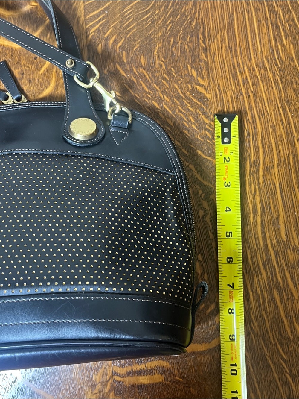 Dooney & Bourke Black Perforated Cabriolet Dome Satchel with Gold Stud Accents. - Picture 5 of 9